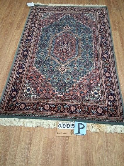 Oriental Rug: Oriental rug. 73.125"l x 46.25"w. See photos. Please read the Terms and Conditions of this auction THOROUGHLY for IMPORTANT bidder information.
