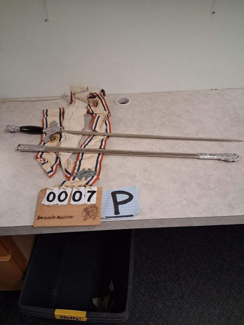 Knights of Columbus Sword and Two Wood Bows: Knights of Columbus ceremonial sword and two wood bows. See photos. Please read the Terms and Conditions of this auction THOROUGHLY for IMPORTANT bidder information.