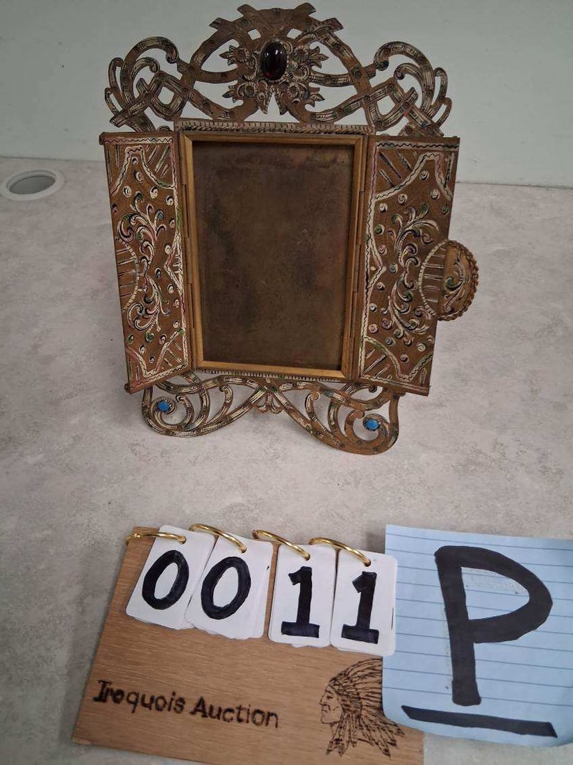19c Engraved Brass Picture Frame: 19th century engraved brass picture frame. 7"w x 9.625"h. See photos. Please read the Terms and Conditions of this auction THOROUGHLY for IMPORTANT bidder information.