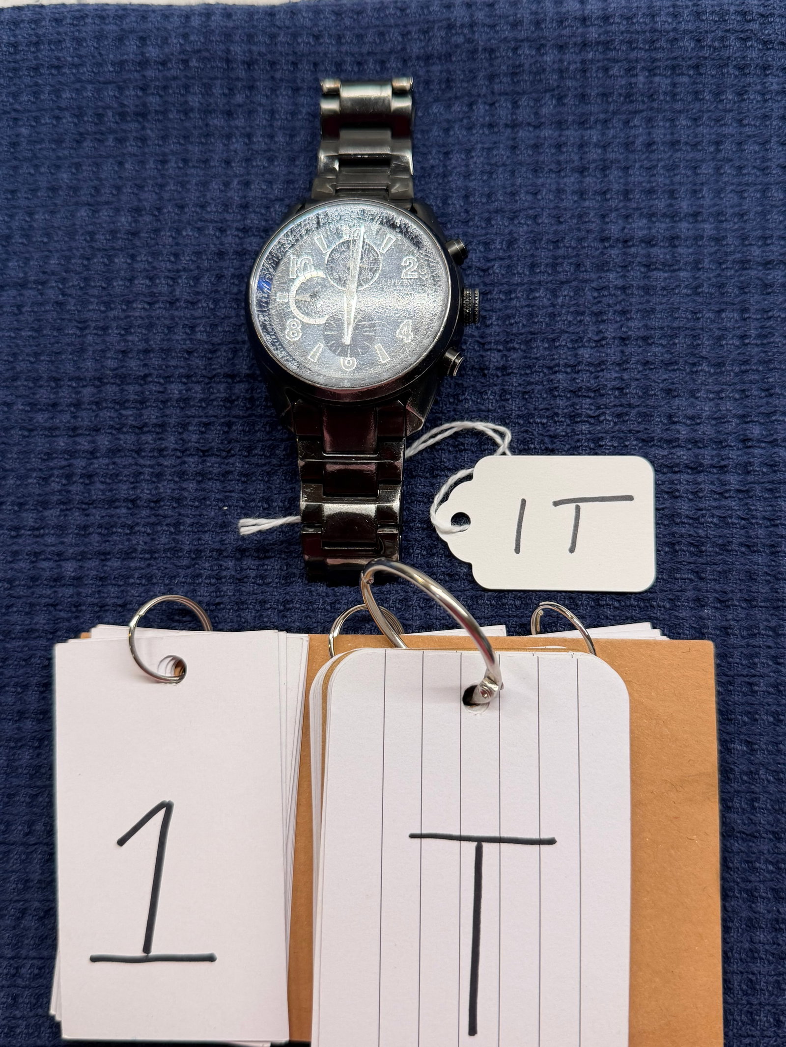 Citizen Eco-Drive Chronograph Watch: Citizen Eco-Drive Chronograph Watch. Black in color. Cleaned and verified to be in working condition by professional jeweler. WR 100 (water resistant to 100 meters). Crystal has significant scratches 