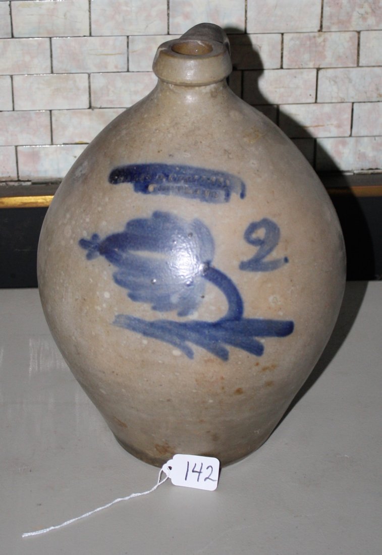 From the home of Dr. Jerry Jacobson M.D.: From the home of Dr. Jerry Jacobson M.D. Ophthamologist. (92) Blue decorated Cortland, N.Y. 2 gallon Oviod 1830s floral jug. (small chip to spout) 19th century. 9"W x 13 1/2"H.