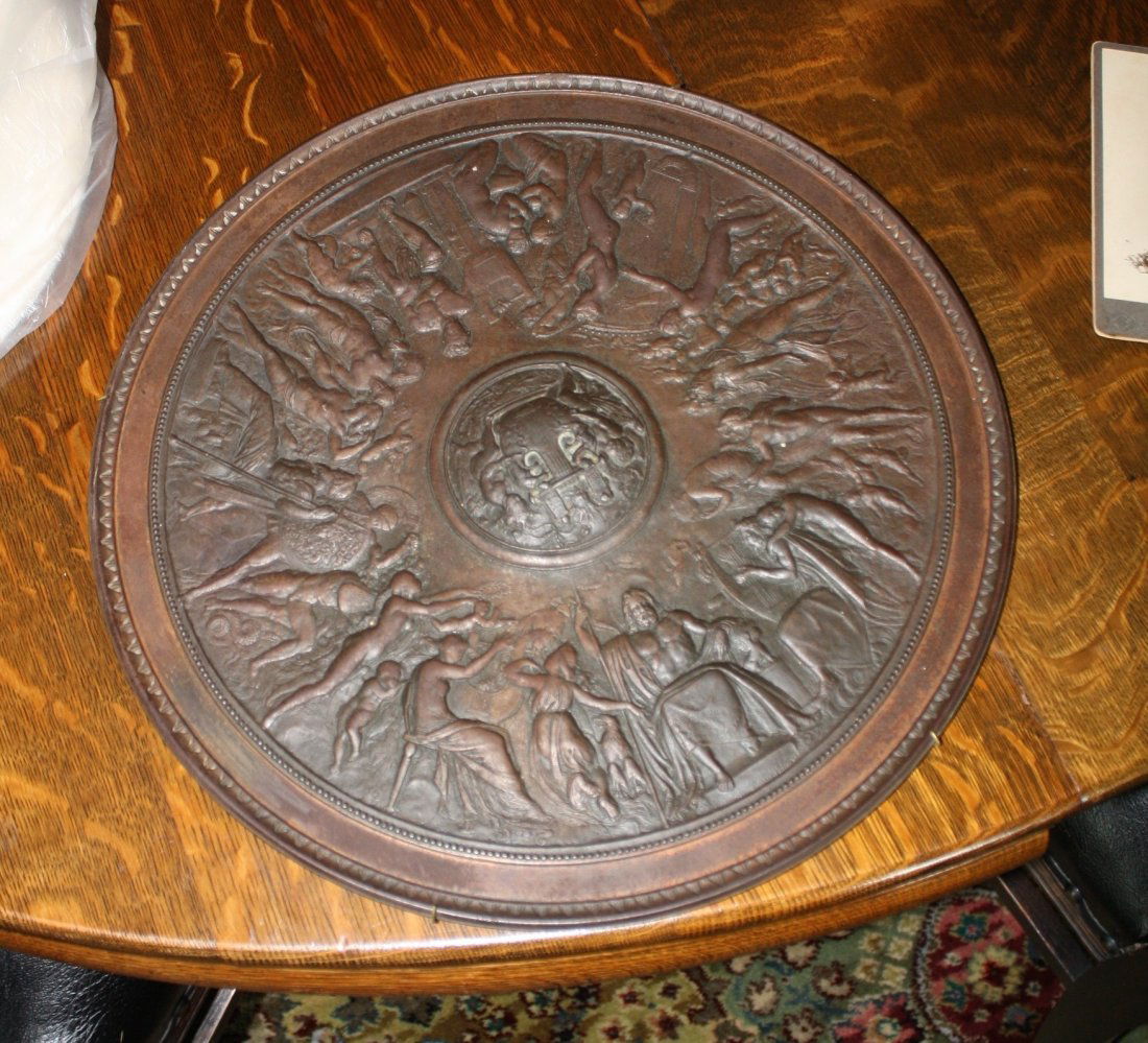 Round hanging cast iron circa early 19th century of: Round hanging cast iron circa early 19th century of Greek Pantheon (The Gods Assembled) in original brown patina. 15 3/4”W