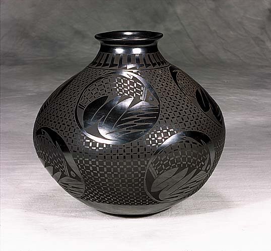 Mata Ortiz pottery olla, by Jesus Tena: black on black geometric and fish design, signed on underside. (Very good original condition) H14"