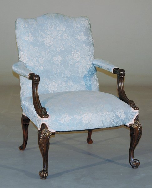 George III style carved mahogany library armchair