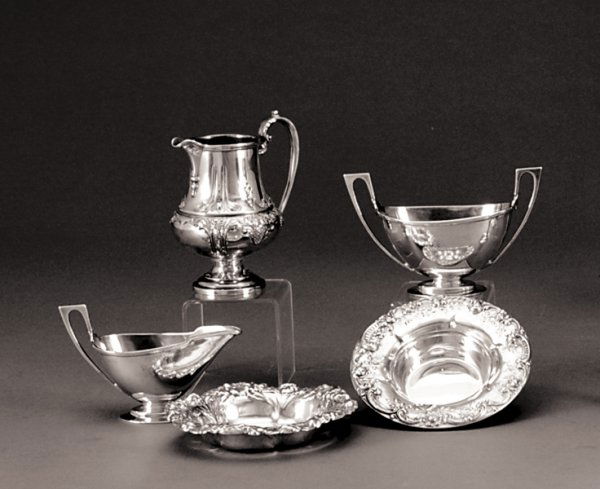 Assortment of five sterling table accessories (Tot: Assortment of five sterling table accessories (Total 5pcs) Assortment of five sterling table accessories repousse pitcher by Ellmore, H5 1/2" L4 1/2" W3 1/2"Gorham cream and sugar set, engraved with i