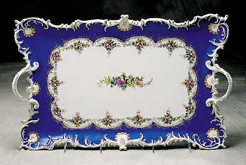 034: Meissen style gilt and painted serving tray rectan: Meissen style gilt and painted serving tray rectangular form with molded scrolling rim fitted with handles, in royal blue decorated with sprays of flowers and gilt accents, on scrolling rococo feet. (