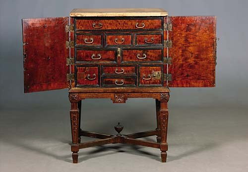 Oriental curly maple apothecary chest on stand mid
