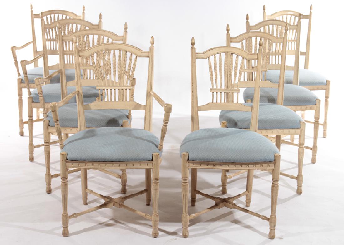 SET OF 8 CARVED AND PAINTED DINING CHAIRS: A set of eight carved and painted dining chairs with upholstered seats including four armchairs and four side chairs all supported on turned legs. Ht: 40" Wd: 25" Dpth: 19.5"