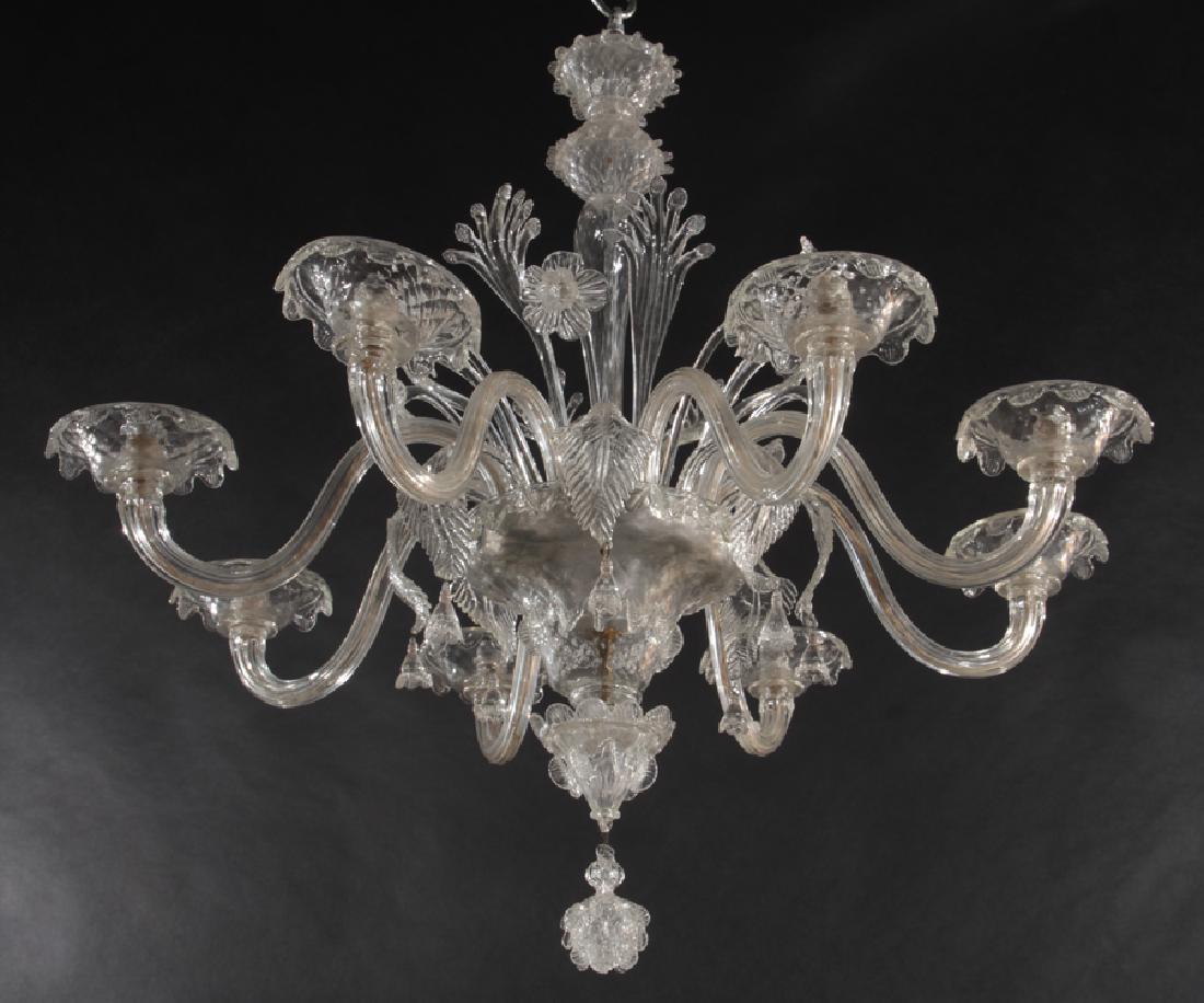 MURANO GLASS CHANDELIER FLORAL FOLIATE C.1960: A Murano glass chandelier having center post with floral and foliate decoration circa 1960. Ht: 38" Width: 36"