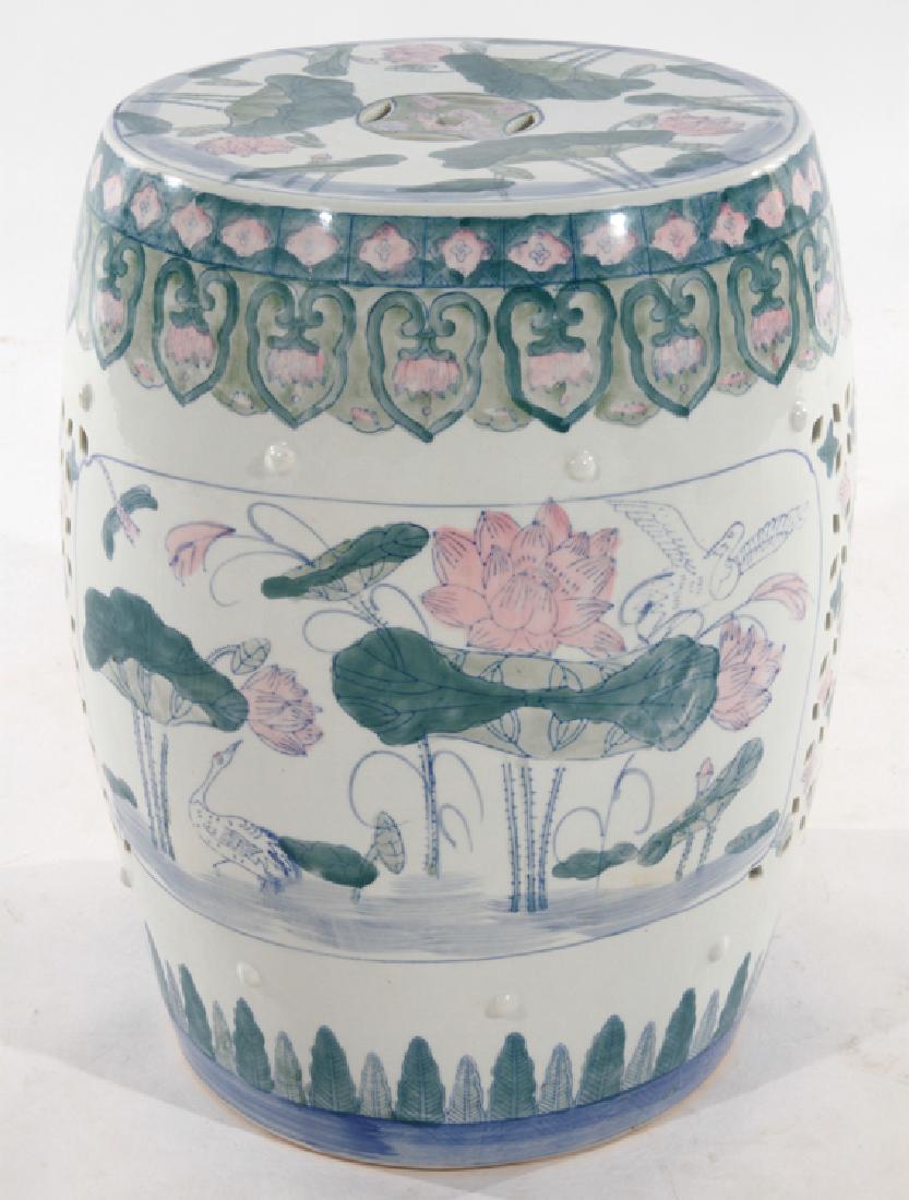 PORCELAIN CHINESE GARDEN SEAT FOLIATE AND CRANE: A porcelain Chinese garden seat having foliate and crane decoration. Ht: 14.5" Wd: 18"