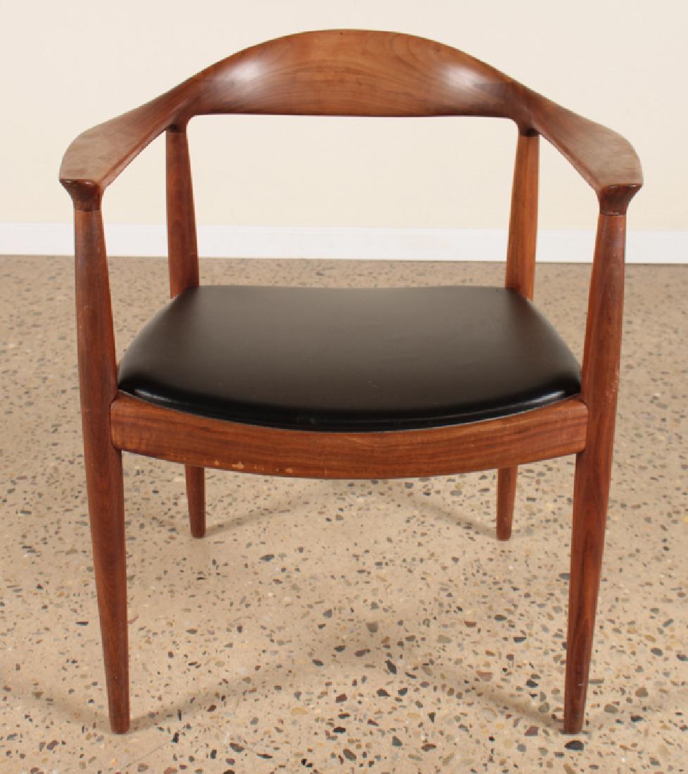 HANS WEGNER TEAK AND LEATHER "THE CHAIR" C.1960: A Hans Wegner designed teak and leather "The Chair" by Johannes Hansen, distributed by Knoll circa 1960. Knoll label on underside. Ht: 30.25" Wd: 25"