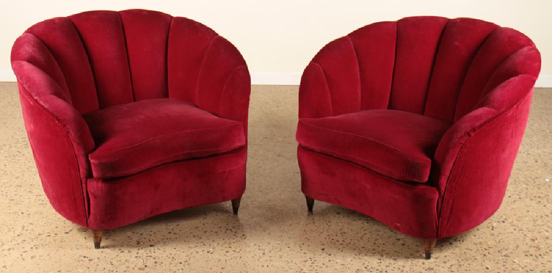 PAIR ITALIAN CLUB CHAIRS MANNER OF GIO PONTI 1950: A pair of mid century modern Italian curved upholstered club chairs having scalloped backs in the manner of Gio Ponti circa 1950. Ht: 30" Wd: 37" Dpth: 32"