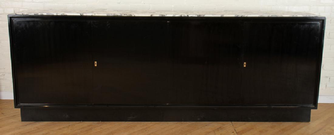 EBONIZED SIDEBOARD WITH WHITE MARBLE TOP C.1965: An ebonized sideboard having white marble top and four doors circa 1965. Ht: 40.5" Wd: 107" Dpth: 17.5"