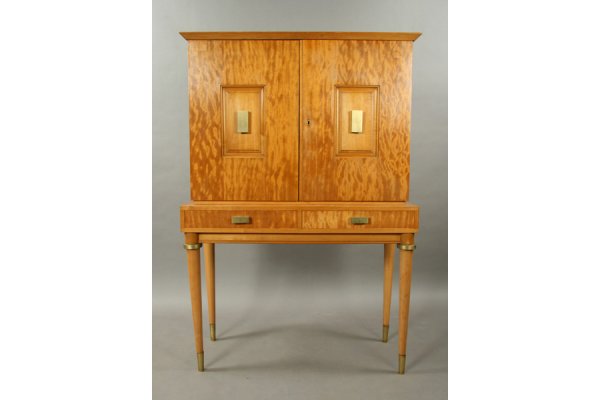 Very nice Andre Arbus style cabinet on stand.: Very nice Andre Arbus style cabinet on stand. Two door top with inset panel decoration and bronze pulls over two drawers with matching bronze pulls supported on turned and tapered legs with bronze cap