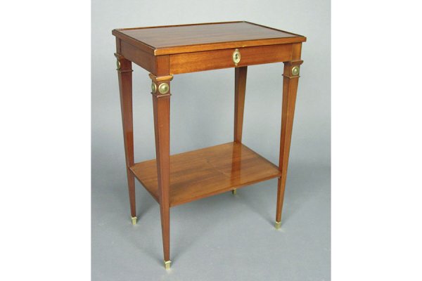 Good Jansen single mahogany end table in: Good Jansen single mahogany end table in the Empire style with simple bronze mounts and one drawer circa 1900. 26 x 18.5" x 12.5"