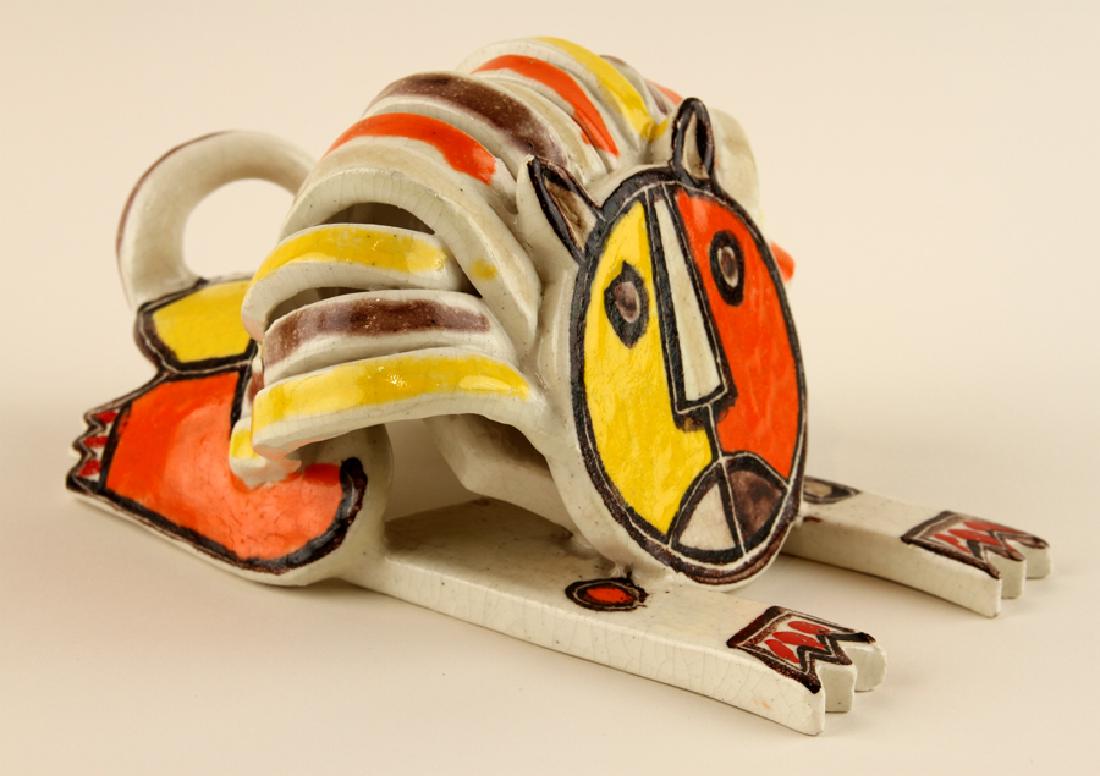 GUIDO GAMBONE GLAZED EARTHENWARE LION SIGNED: Guido Gambone (Italian, 1909-1969) A mid century modern glazed earthenware lion figure, signed. Ht: 5" Wd: 6.5" Dpth: 9.5"