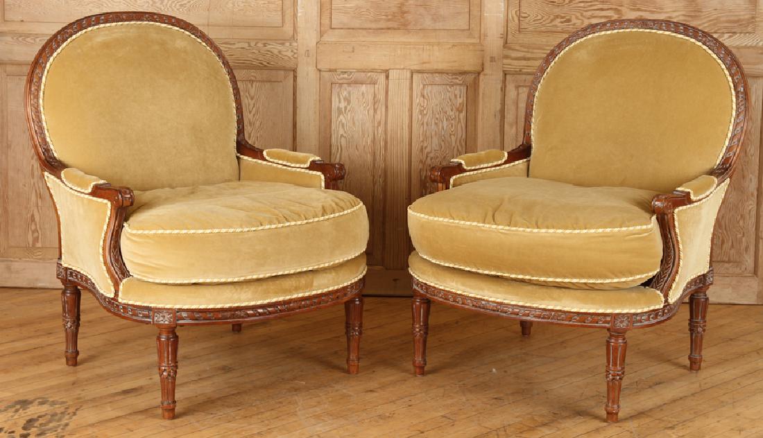 PAIR LOUIS XVI STYLE BERGERE CHAIRS BY CENTURY: A pair of Louis XVI style upholstered bergere chairs by Century. Ht: 41.5" Wd: 31" Dpth: 34" Seat: 22.5"