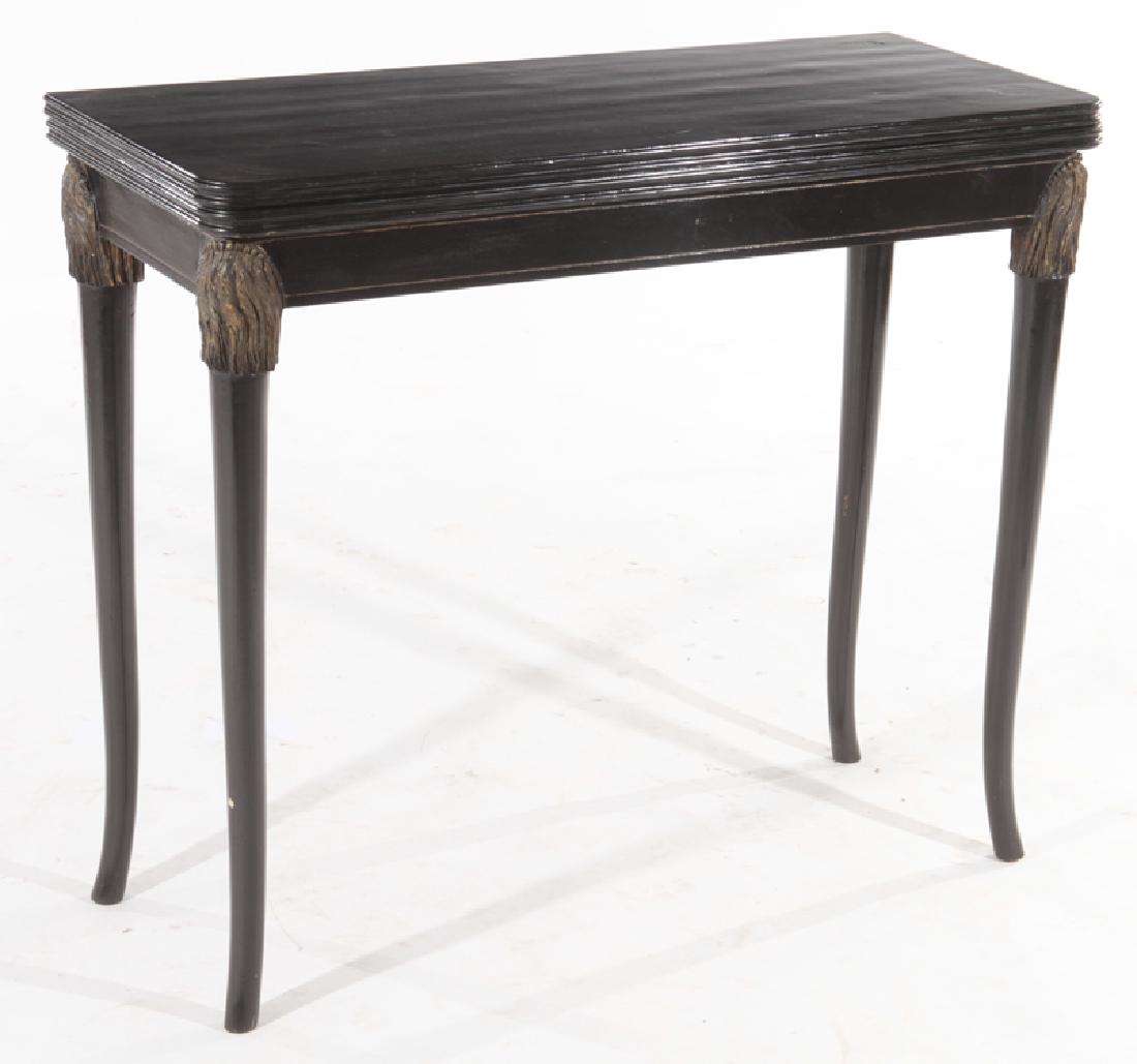 FRENCH EBONIZED FLIP TOP GAMES TABLES CIRCA 1910: A French ebonized flip top games table having inset felt top circa 1910. Ht: 30.5" Wd: 35.5" Dpth: 14.75" -extends to 29.5"