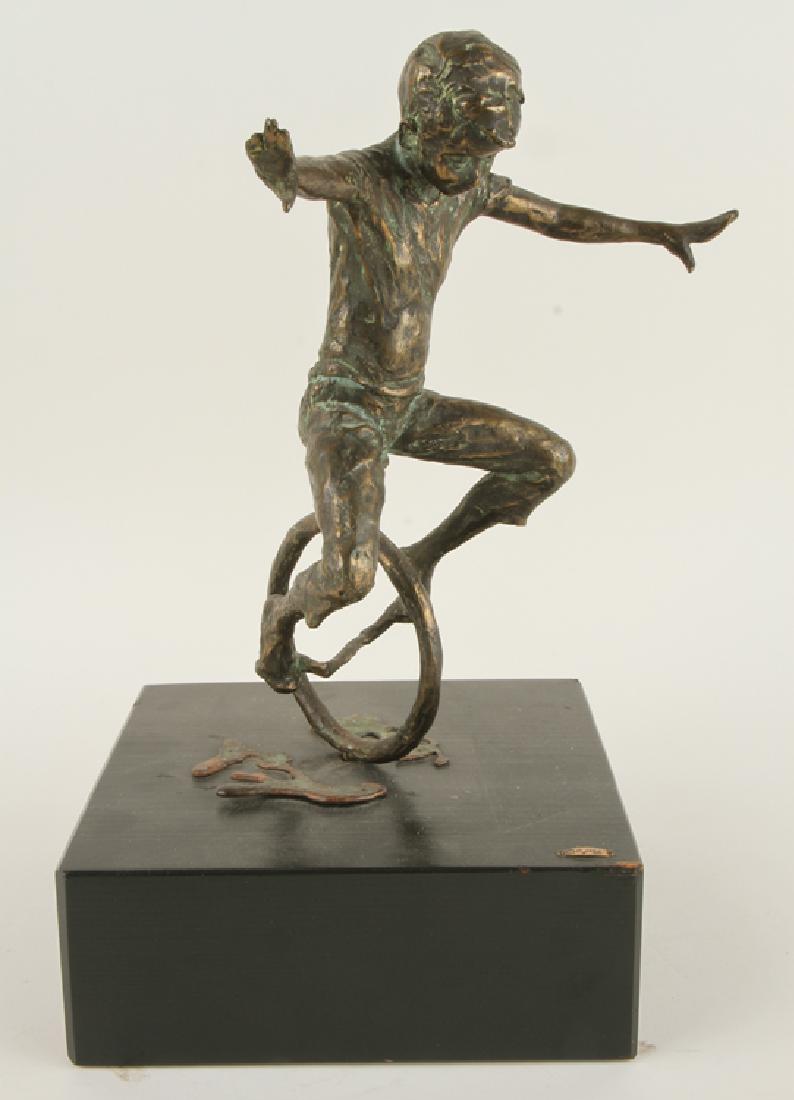 CURTISE JERE BRONZE SCULPTURE CHILD 1969: Curtis Jere (American, 1910-2008) A bronze sculpture of a child at play raised on wood base circa 1969. Having a plate on base marked C. Jere '69. Provenance: From the original collection of Richard