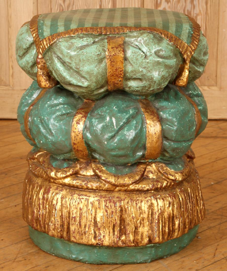 POLYCHROME STOOL STACKED PILLOWS GOLD GREEN PAINT: A polychrome plaster and wood stool in the form of stacked pillows having gold and green paint. Ht: 17.75" Dia: 15"