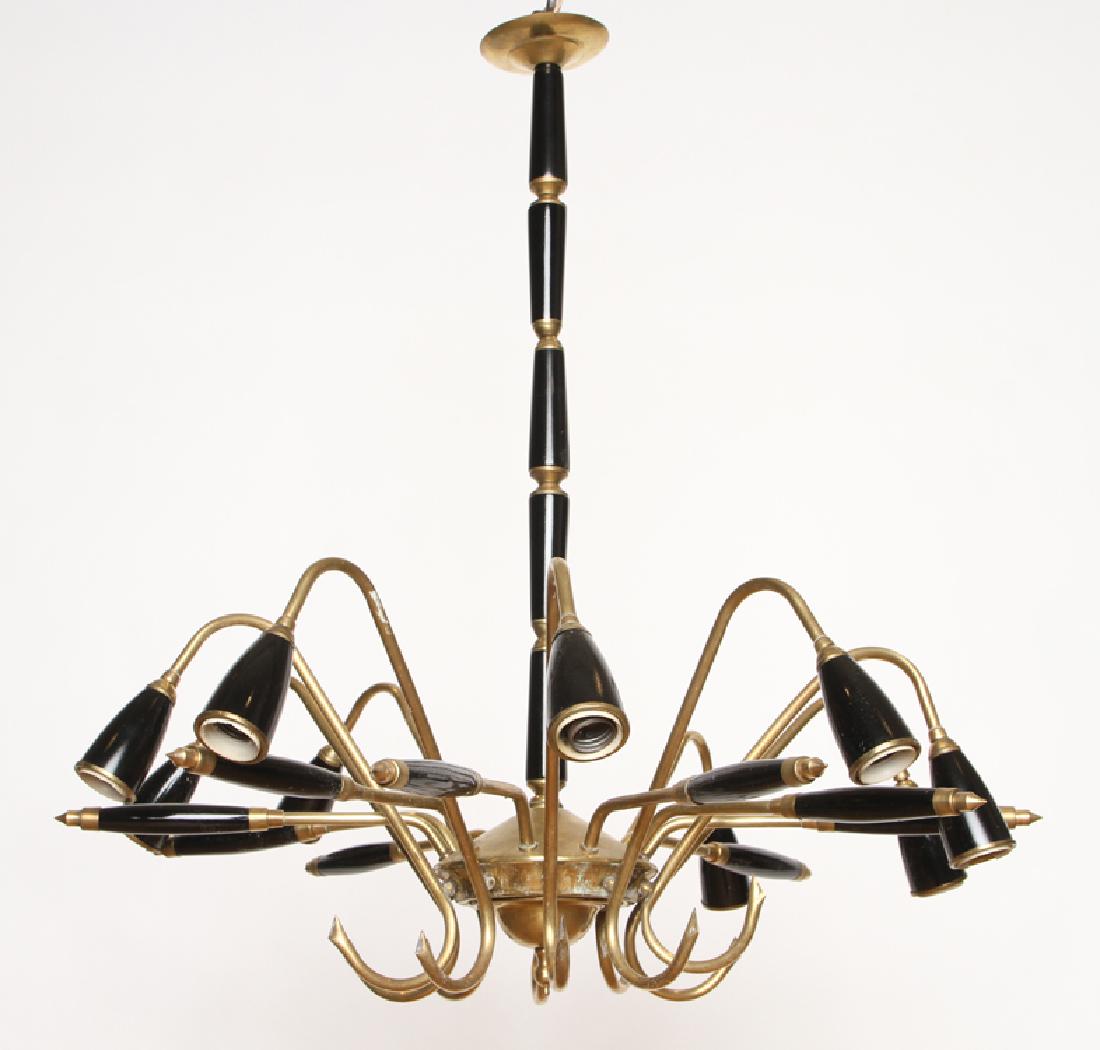 10 ARM ITALIAN WOOD BRASS CHANDERLIER 1950: A ten arm Italian ebonized wood and brass chandelier circa 1950. Ht: 30" Wd: 28"