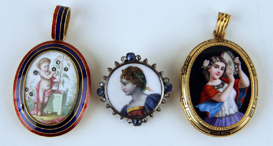 GROUPING OF THREE 18 KARAT GOLD ITEMS 25.65 DWT: A grouping of three 18 karat gold items circa 1890, total weight: 25.65 DWT. To include: Two enameled lockets One enameled pin All set with diamonds.