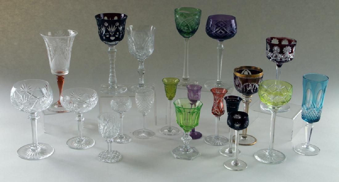 57 PC. COLORLESS & CUT TO CLEAR CRYSTAL STEMWARE: A fifty seven piece lot of colorless and cut to clear crystal stemware. Comprised of: Eleven colorless wine glasses: 7" Seven colorless goblets: 7" Six colorless champagnes: 5.25" Three colorless smal