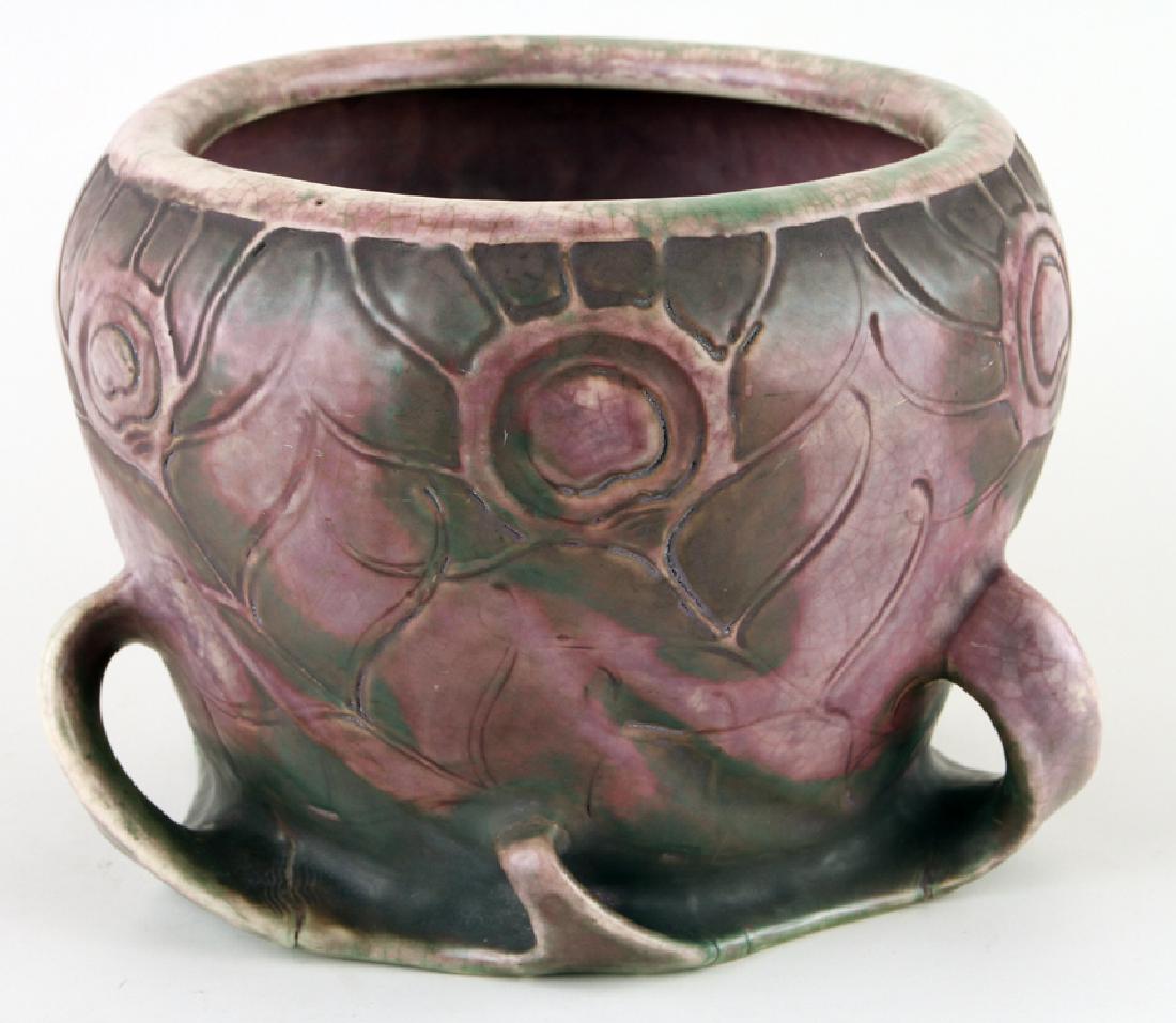 RIESSNER STELLMACHER KESSEL KUTANI JARDINIERE: An Art Nouveau Riessner, Stellmacher and Kessel Amphora Kutani jardiniere having peacock feather motif, marked. Ht: 8.5" Dia: 13"