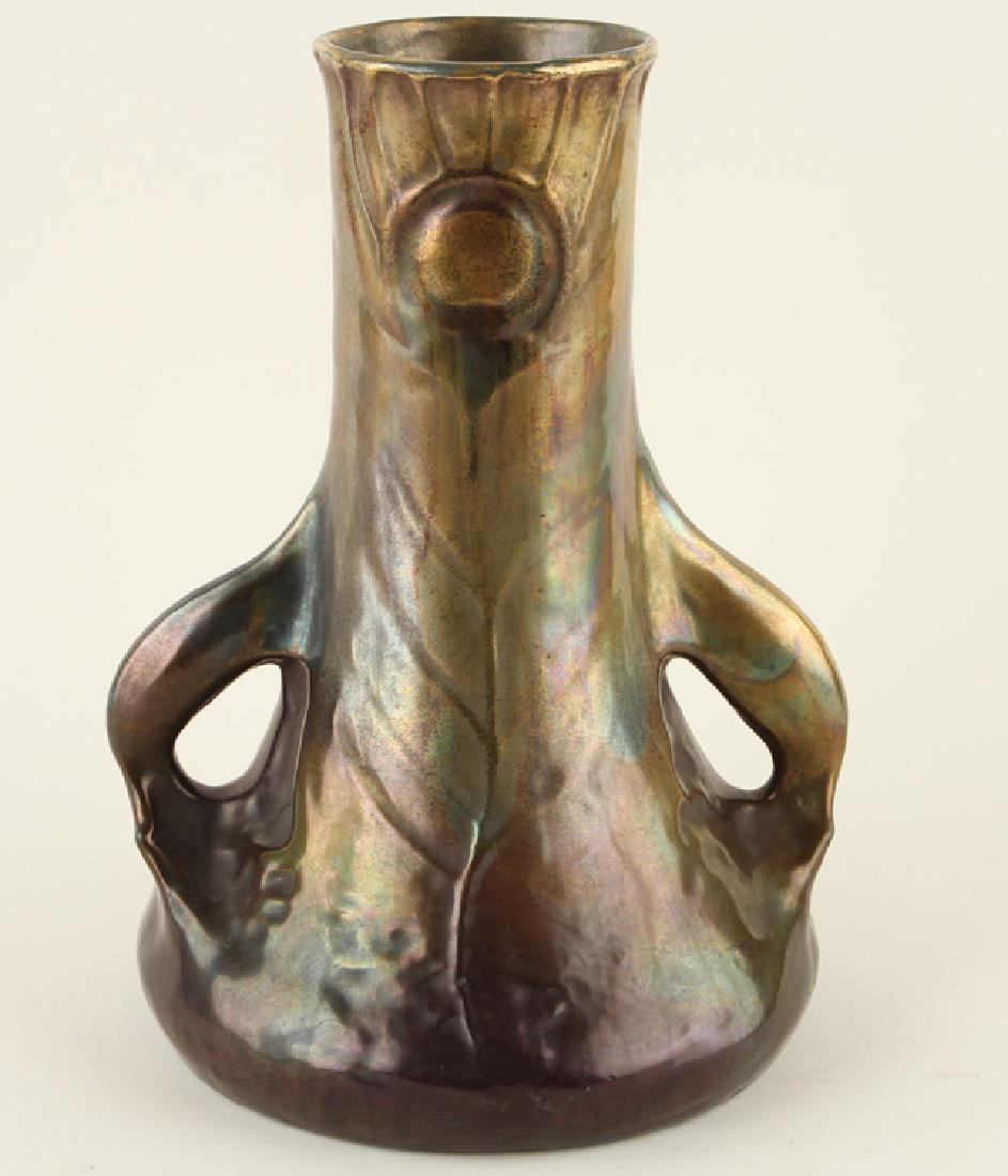 RIESSNER STELLMACHER KESSEL AMPHORA KUTANI VASE: An Art Nouveau Riessner, Stellmacher and Kessel Amphora Kutani two handled vase with peacock feather motif, marked. Ht: 12.5" Dia: 9"