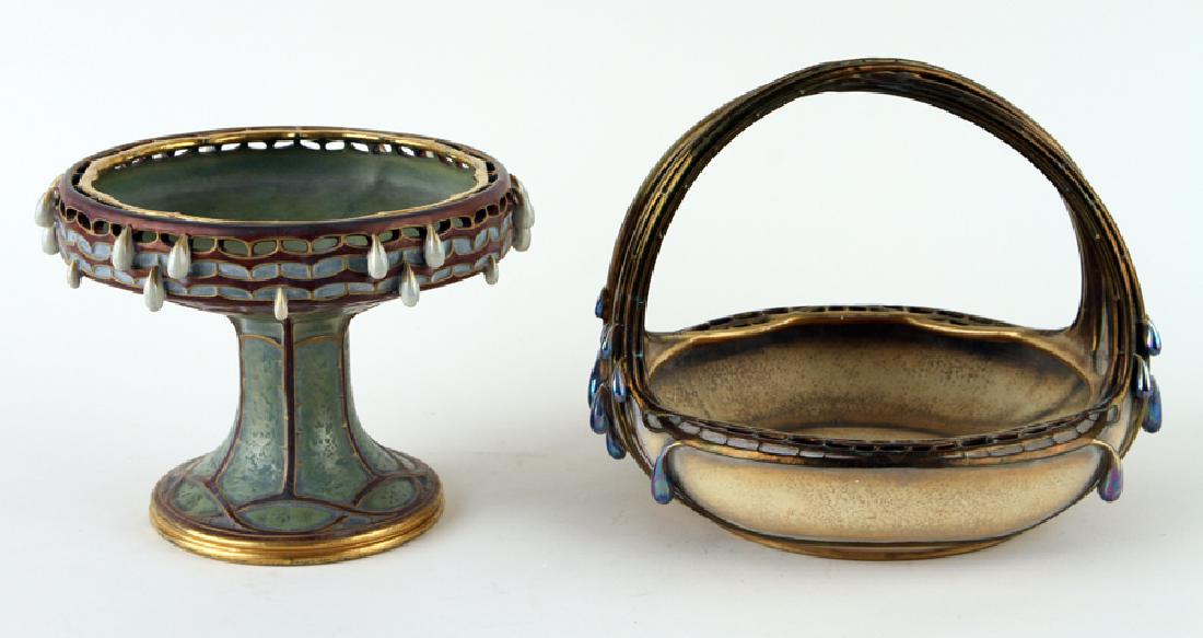 PAUL DACHSEL TWO AMPHORA TEAR DROP VESSELS MARKED: Paul Dachsel (Austrian, 19th century) Two Art Nouveau Amphora tear drop vessels, both marked. To include: A handled basket with tear drop motif: Ht- 8.75" Dia- 8.25" A coupe: Ht- 6.5" Dia- 8.25" Both 