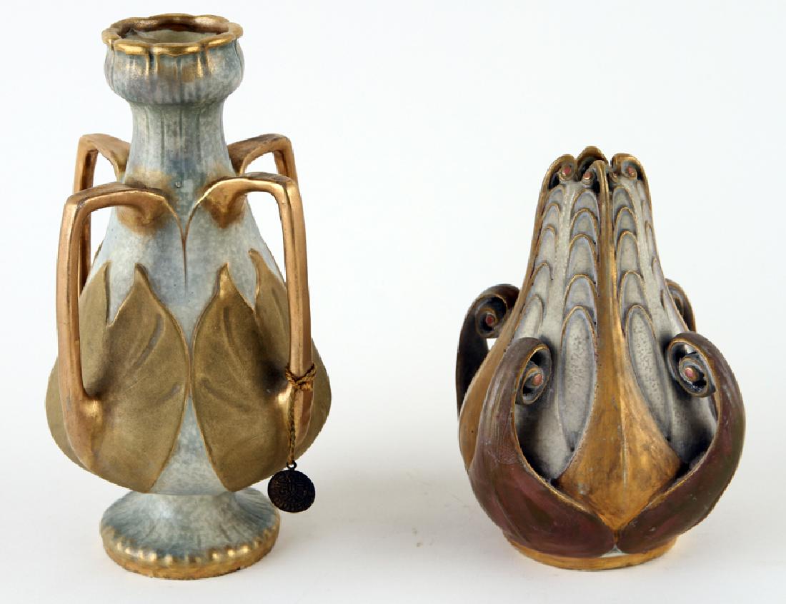 TWO PAUL DACHSEL ART NOUVEAU AMPHORA VASES MARKED: Paul Dachsel (Austrian, 19th century) Two Art Nouveau Amphora vases, both marked. Consisting of: A four handled vase by Dachsel with original metal label: 7.75" A vase with fern motif: 6"