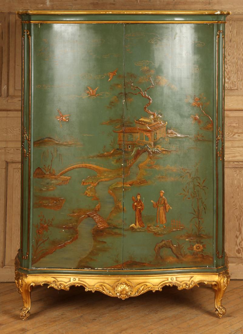 ITALIAN PAINTED GILT ARMOIRE CHINOISERIE C.1940: An Italian painted and gilt two door armoire having chinoiserie decoration circa 1940. Having a fitted interior with multiple glass front doors. Ht: 72.5" Wd: 52" Dpth: 22"