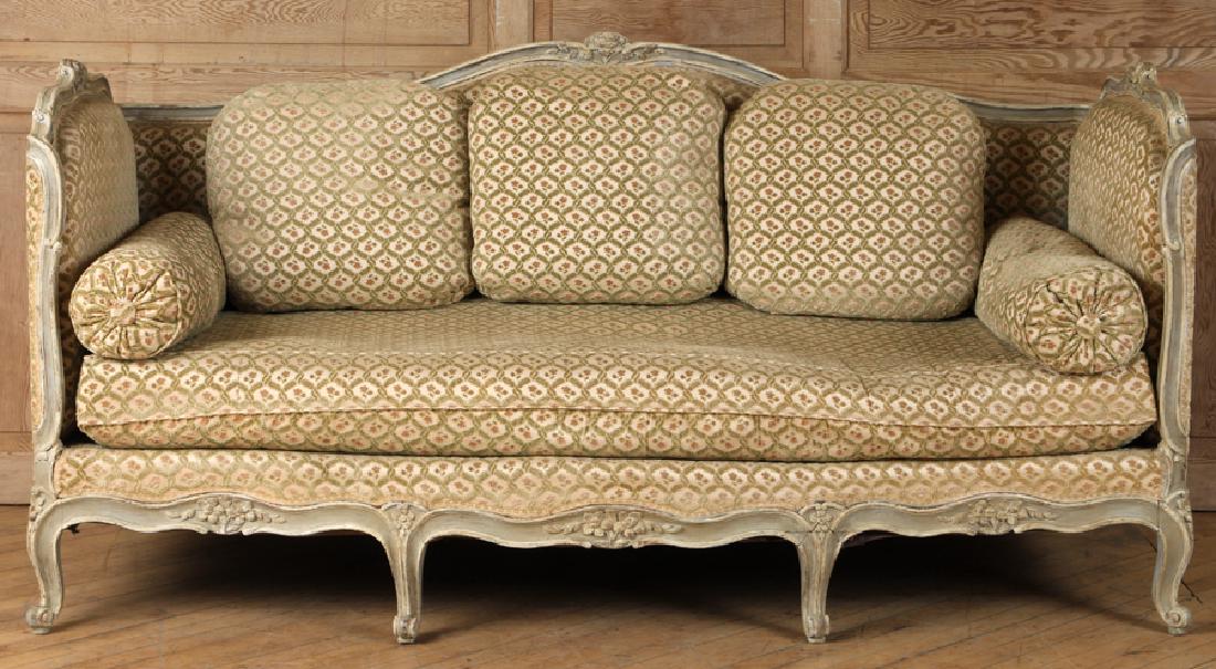 FRENCH CARVED AND PAINTED SOFA C. 1900: A French carved and painted sofa having high back and arms circa 1900. Ht: 38" Wd: 79" Dpth: 32" Seat: 21"
