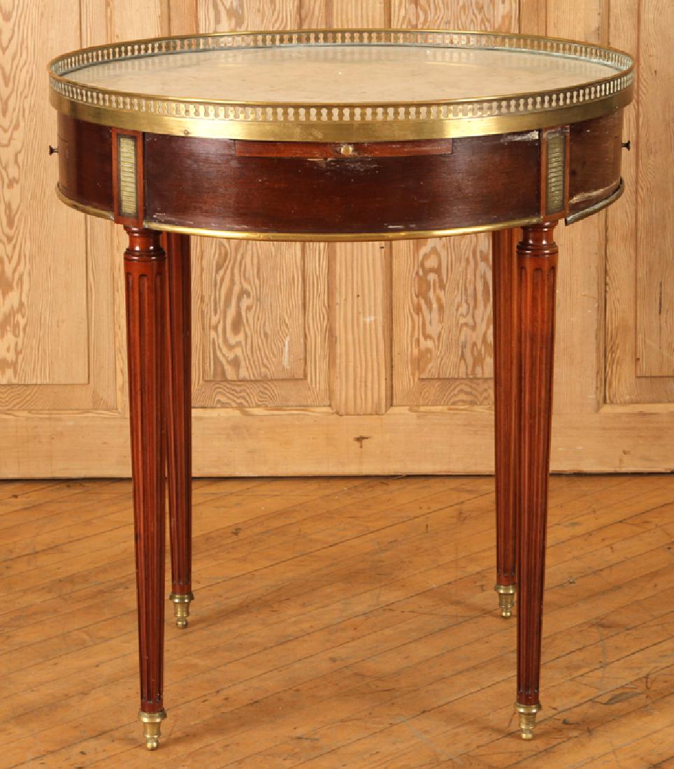 FRENCH MAHOGANY BOULETTE TABLE LOUIS XVI STYLE: A French mahogany boulette table in the Louis XVI style. Having marble top, bronze pierce work gallery, bronze mounts and two pull-out panels. Ht: 30" Dpth: 26"