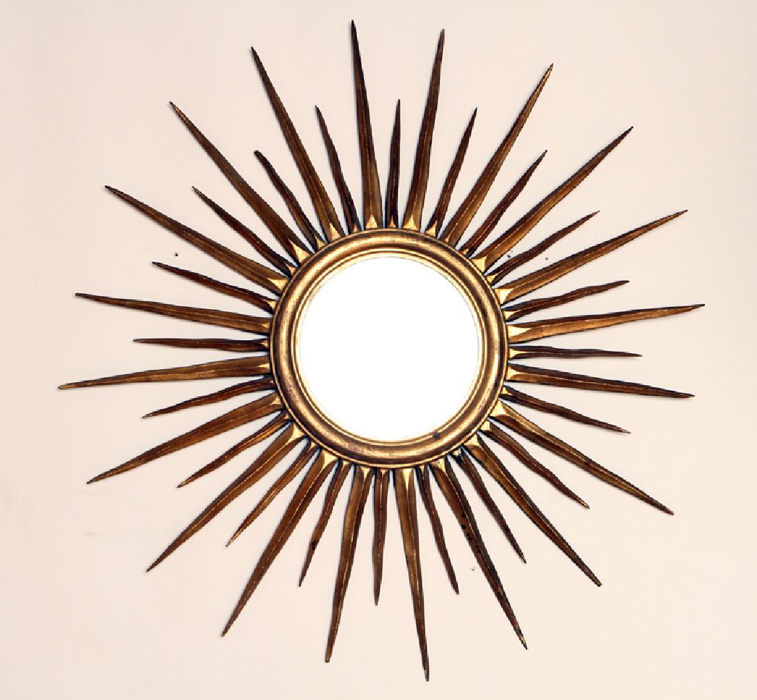 SUNBURST MIRROR MANNER OF LINE VAUTRIN C.1950: A sunburst mirror in the manner of Line Vautrin circa 1950. Dia: 29"