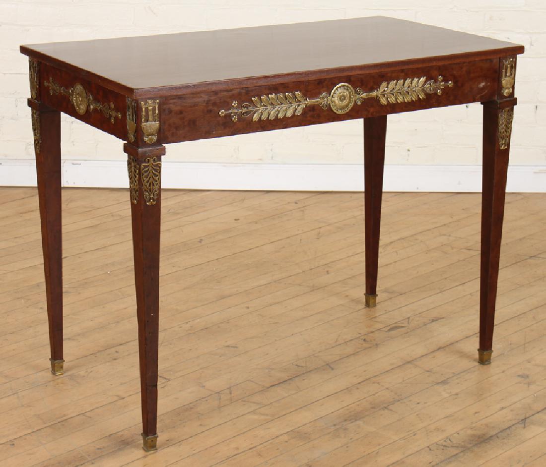 EMPIRE STYLE MAHOGANY BRONZE SIDE TABLE: A signed Jansen Empire style mahogany and bronze side table having classical bronze accents throughout circa 1930. Ht: 27.75" Wd: 35" Dpth: 19.5"