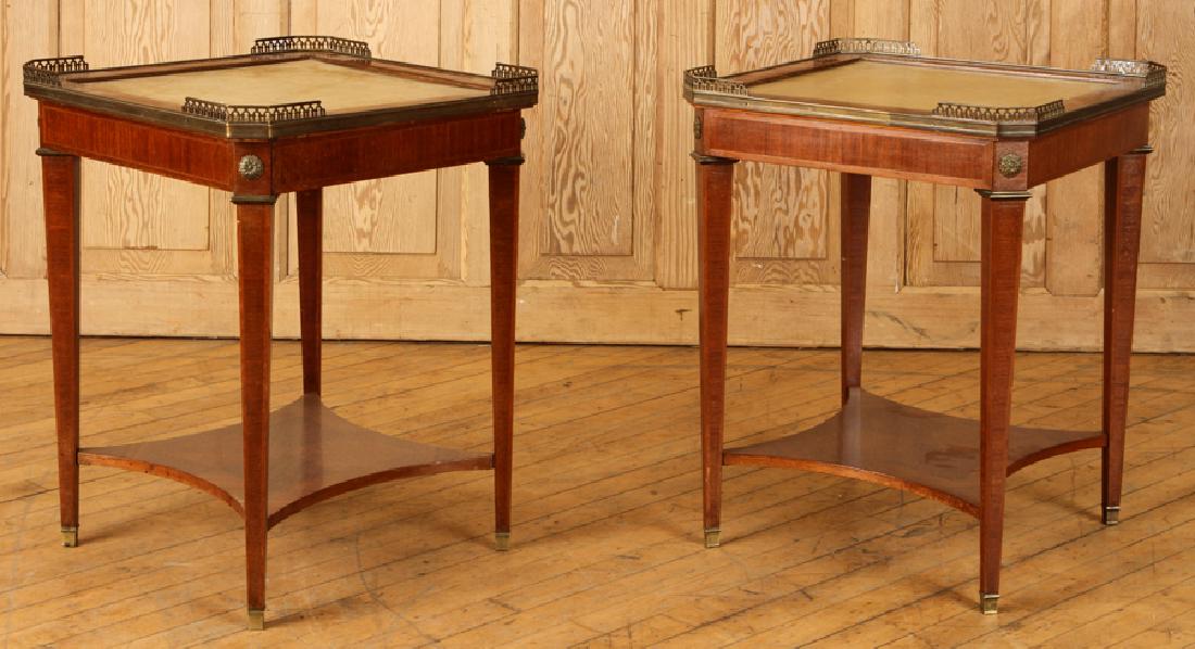 PAIR MAHOGANY REGENCY STYLE END TABLES CIRCA 1950: A pair of mahogany Regency style bronze mounted and leather top end tables circa 1950. Ht: 24" Wd: 19" Dpth: 19"
