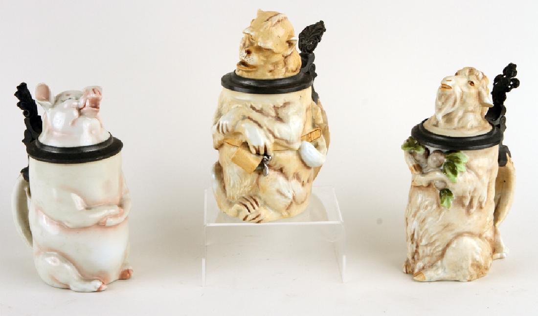 THREE MARKED SCHIERHOLZ GERMAN PORCELAIN STEINS: A lot of three marked Schierholz German porcelain character beer steins in the form of animals. To include: Drunken Monkey, 0.5 liter Goat, 0.5 liter Pig, 0.5 liter All are marked to base.