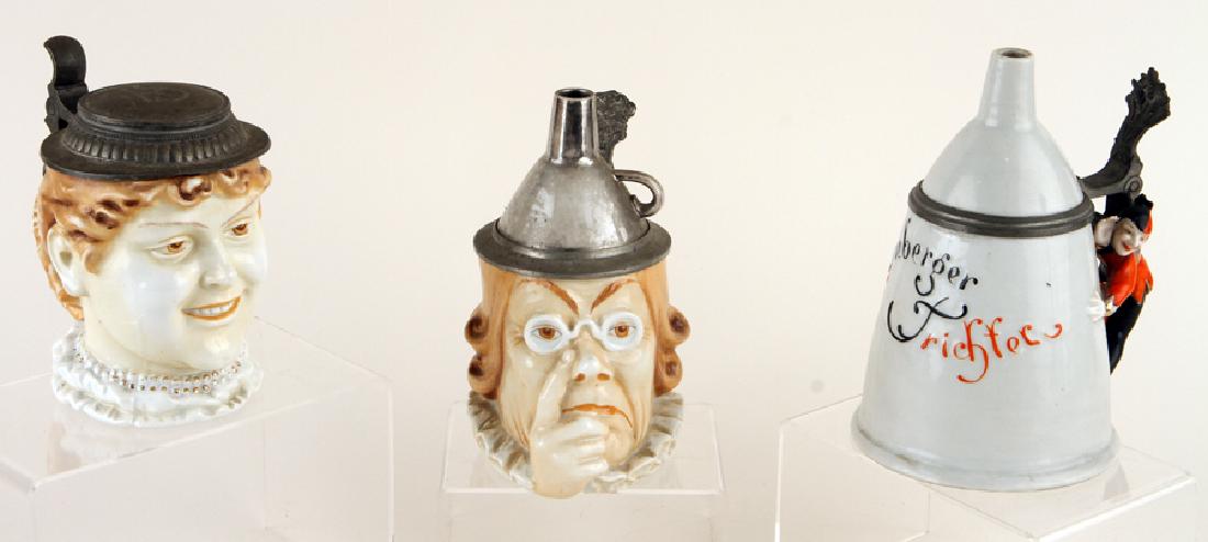 THREE GERMAN SCHIERHOLZ PORCELAIN BEER STEINS: A lot of three German Schierholz porcelain character beer steins including Nuremberg Judge. To include: Schierholz, Nuremberg Funnel with lithophane, 0.5 liter Schierholz, Woman with hat as cover, 0.5