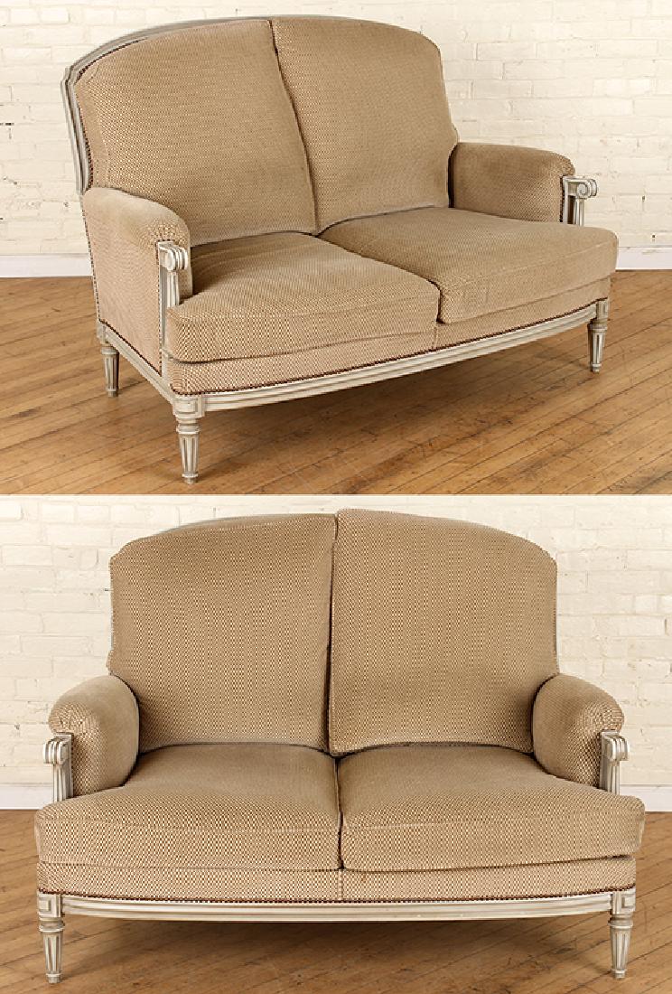 PAIR FRENCH LOUIS XVI STYLE PAINTED SETTEES C1950: A pair of French Louis XVI style painted settees circa 1950. Ht: 38.5" Wd: 53" Dpth: 36"