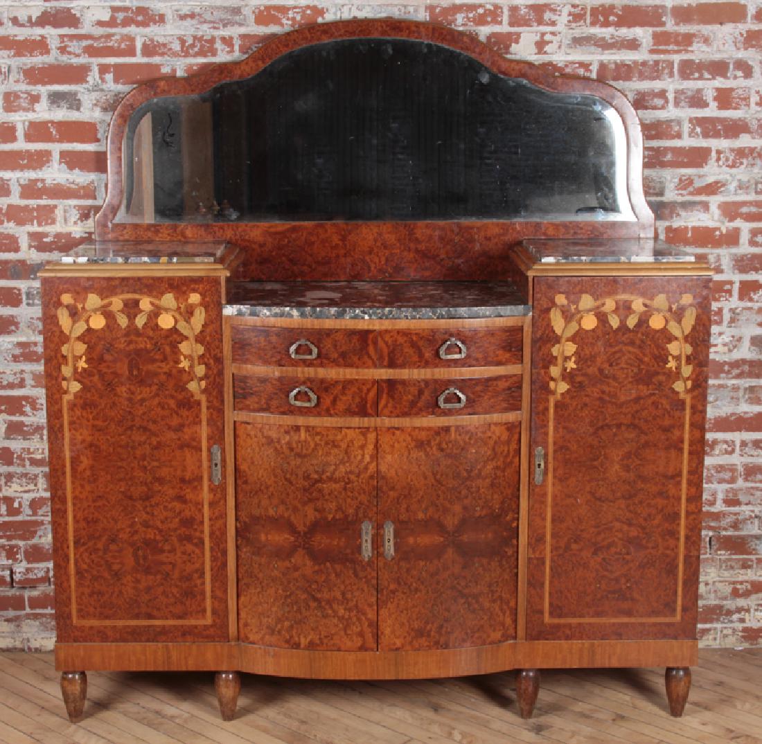 MARBLE TOP ART NOUVEAU BURL WOOD BUFFET C.1915: A marble top Art Nouveau burl wood and floral inlaid buffet circa 1915. Having beveled mirror top and the case having four drawers and four open compartment doors. Ensuite Ht: 66.5" Wd: 63" Dpth: 20.7