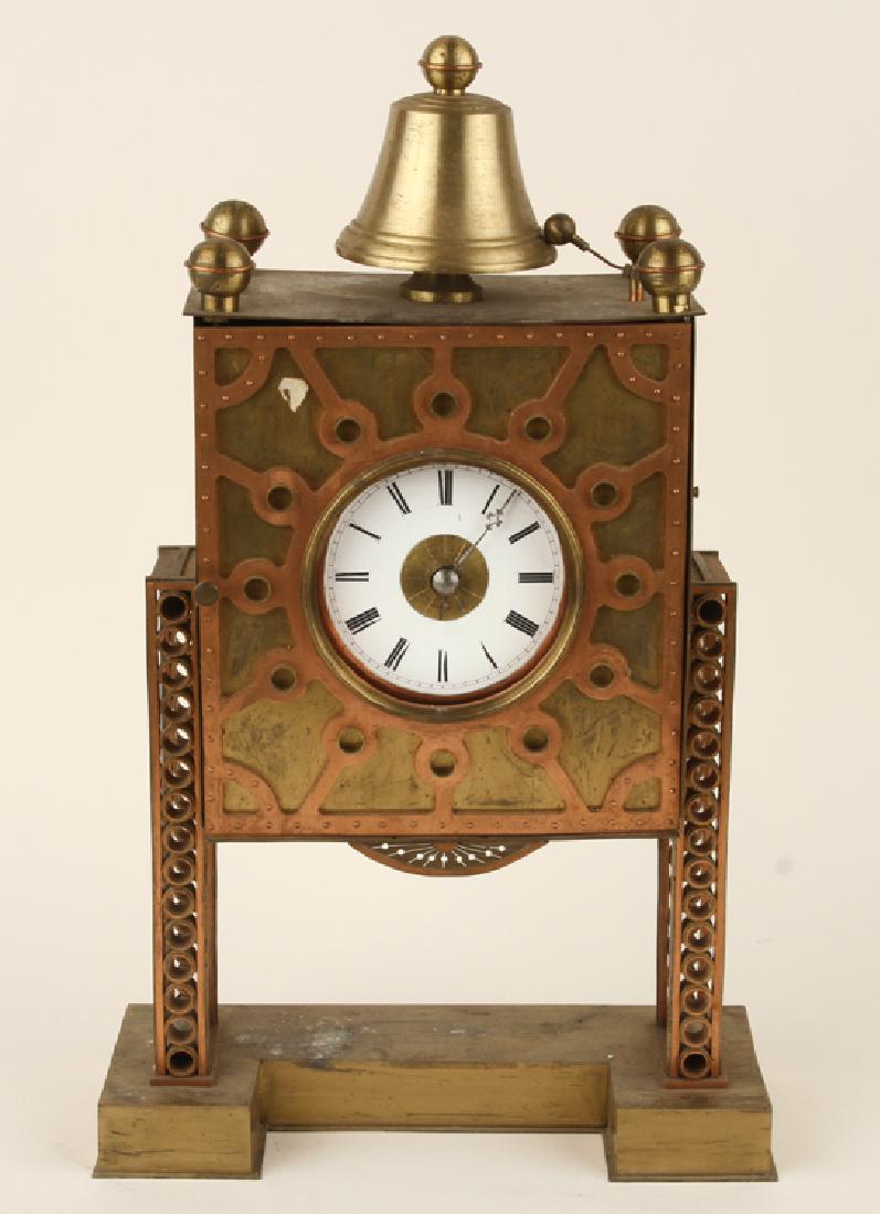 BRASS AND COPPER MANTLE CLOCK MARKED HUREL 1952: A mid century modern brass and copper mantle clock with enameled dial, marked Hurel, 1952. Ht: 18.25" Wd: 11.25" Dpth: 4.75"
