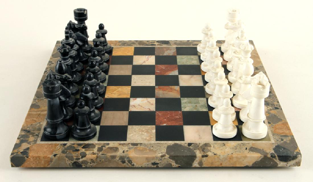 MARBLE BOARD CHESS SET & 36 MARBLE GAME PIECES: A tessellated marble board chess set with thirty six marble game pieces. Ht: .75" Wd: 13.5" Dpth: 13.5"
