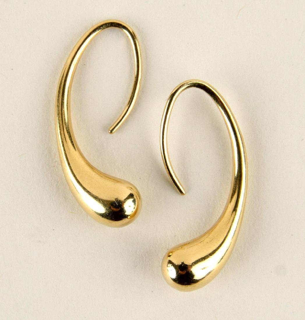 PAIR TIFFANY 18K ELSA PERETTI TEAR DROP EARRINGS: A pair of Tiffany 18 karat Elsa Peretti tear drop earrings with original box, 9.3 grams. Both earrings marked Tiffany, bearing Elsa Peretti signature, stamped 750 and Spain. 26.98 mm in length.