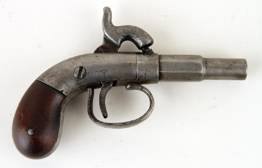 ANTIQUE 19TH C. HAMMER PERCUSSION CAP PISTOL: An antique nineteenth century center hammer percussion cap pistol, possibly Allen & Thurber. 5.25"