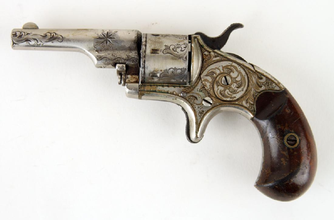 ANTIQUE SINGLE ACTION POCKET REVOLVER 1871-1878: An antique single action pocket revolver having Baroque engravings circa 1871-1878. 5.75"