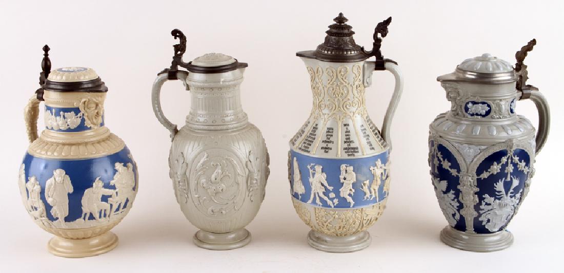 FOUR GERMAN METTLACH LIDDED BEER STEINS: A lot of four German Mettlach lidded beer steins. To include: #1791, Floral pattern with grotesques and inlaid cover, 2.75 liter Indistinctly numbered Mettlach stein, bowling and drinking figures, wit