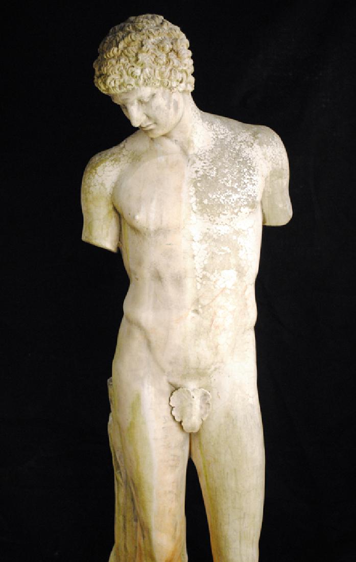 LIFE SIZE CAST STONE FIGURE OF DAVID: A life size cast stone figure of David. Ht: 75" Wd: 20"
