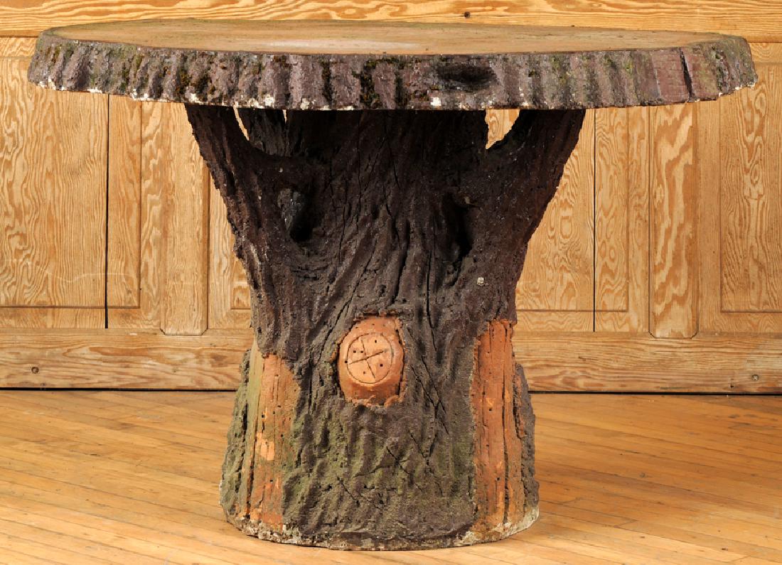 FRENCH STONE FAUX BOIS GARDEN TABLE TREE TRUNK: A round French cast stone faux bois garden table having a pedestal base in the form of a tree trunk. Ht: 30.25" Dia: 45"