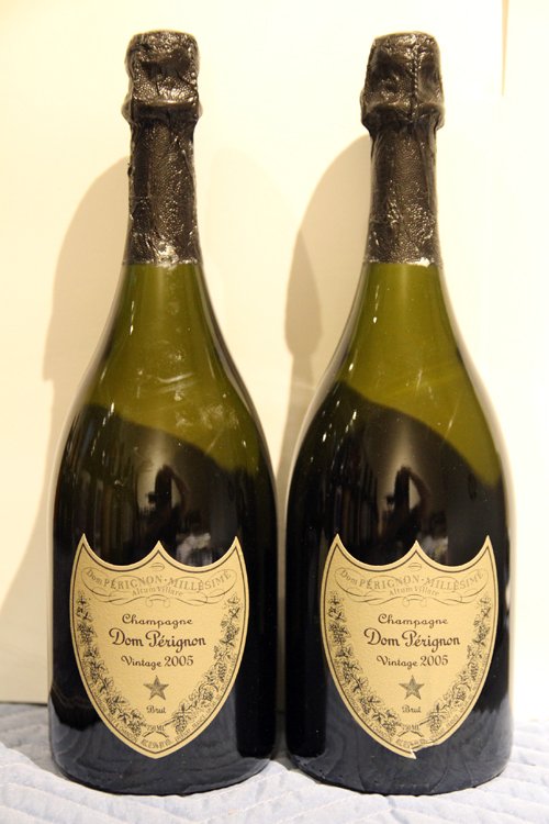 COLLECTION OF ESTATE WINE 2 BOTTLES DOM PERIGNON: A collection of Estate wine consisting of two bottles of Champagne Dom Perignon Vintage 2005.The consignor purchased the wine being offered from retailers and was the original owner. The wine was remo